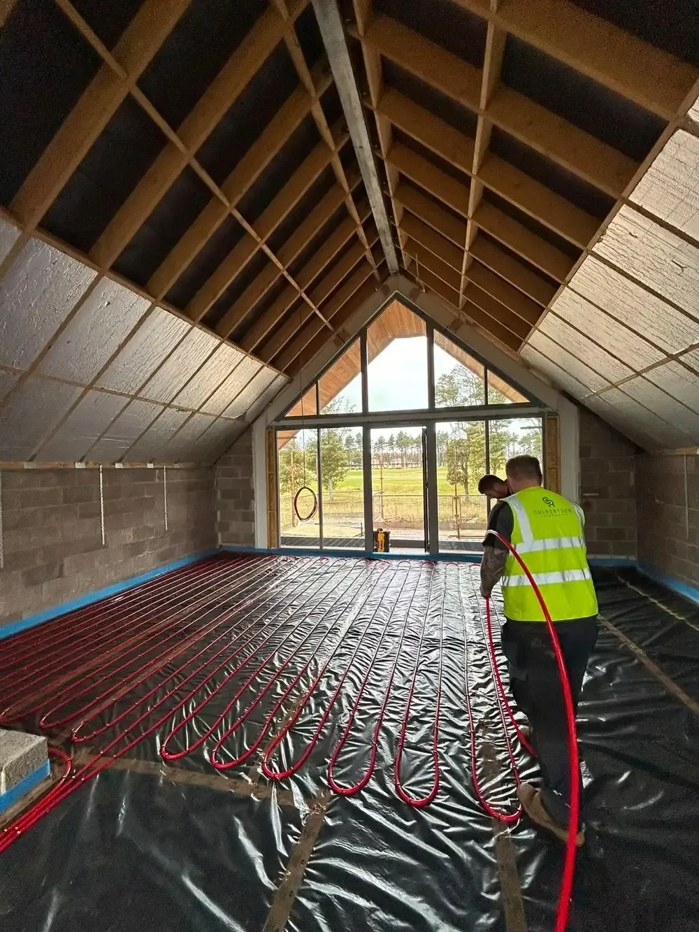 Culbertson engineer installing underfloor heating